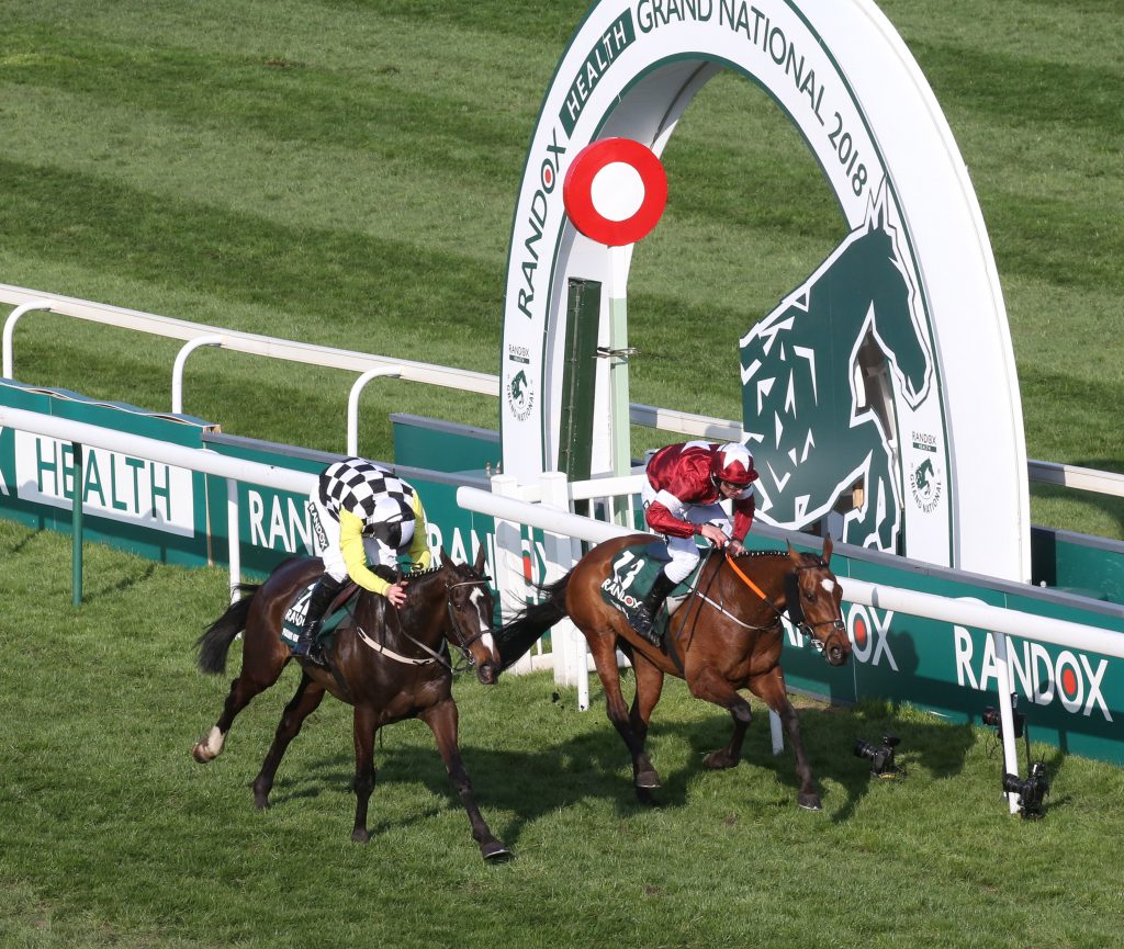 Davy Russell and Tiger Roll win the 2018 Grand National from Pleasant Company